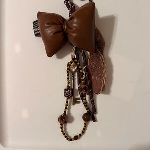 Chic Brown Bow Hair Accessory with Bead Details